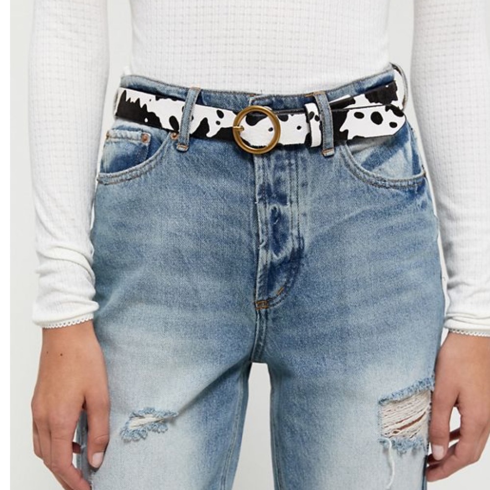 URBAN OUTFITTERS COW PATTERNED HALF CIRCLE BELT